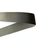 Ranger green elastic webbing folded on white background